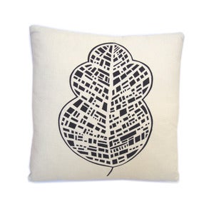 Image of turn over a new leaf cushion.