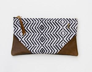 Image of - S O L D- a large black + white zigzag print zipper clutch with leather corners + a METAL zipper