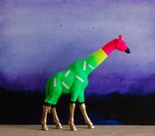 Image of giraffe green /the strange planet