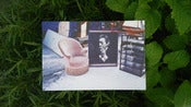 Image of an imaginary journey of july, postcard series no.07