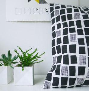 Image of city windows cushion in black and white