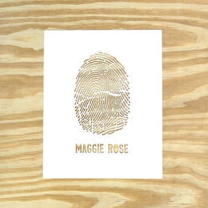 Image of Single Fingerprint {Text} Paper Cutting