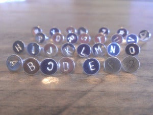 Image of ALPHABET studs