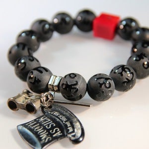 Image of Kesslers High Hat - Carved Black Onyx and Red Coral
