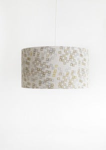 Image of cross dotty mustard and steel shade