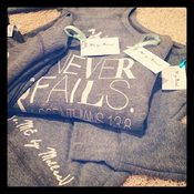 Image of Love Never Fails Sweatshirt