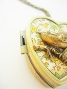 Image of Little Wing Miniature Music Box Locket floral yellows