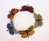 Image of Textile Moth Brooch / Ornament Velvet Upholstery Fabric