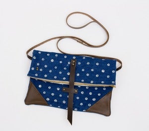 Image of foldover crossbody bag in vintage denim with hand-stamped polka dots