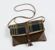 Image of foldover crossbody bag in vintage plaid with leather corners + tassel