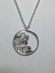 Image of Hand cut 100 franc coin silver plated