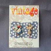 View two little 1950s ladies 