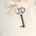 Image of key to my heart - groomsmen boutonniere in bronze