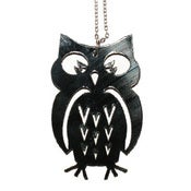 Image of Owl Necklace/Earrings made from a recycled vinyl record.
