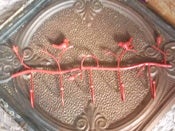 Image of Red Metal Bird 5 Hook Rack