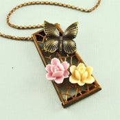 Image of Copper Tone Keystone Filigree Butterfly Necklace with Cream and Pink Flowers