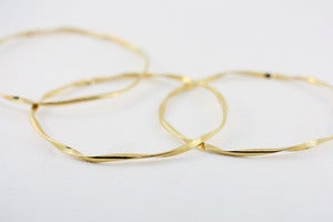 Image of 18k gold vermeil ribbon bangles