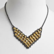 Image of Stud Mesh Chevron Bib