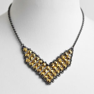 Stud Mesh Chevron Bib
