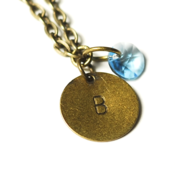 Image of march initial necklace - antiqued brass