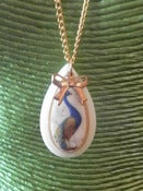 Image of Divine Teardrop Shaped Vintage Peacock Cameo with Gold Beading Trim and Gold Bow Detail...