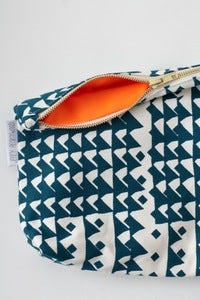 Image of limited edition NEON ORANGE & AQUA zippered pouch