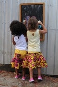 Image of Girls pink and yellow ruffle skirt sz 3-7yrs!