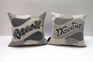 Image of Reversible Reserved/Vacant Cushion