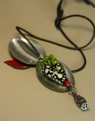 Image of Black and White Winged Heart Pod