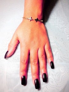 Image of double cross bangle