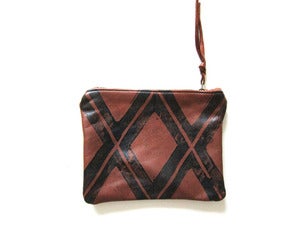 Image of Small brown/black Xs hand-printed leather pouch
