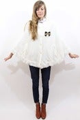 Image of creme cake cape