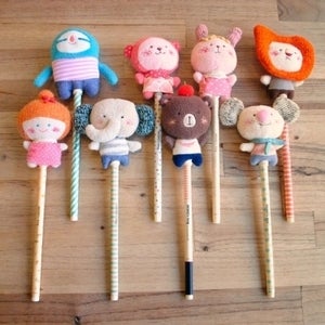 Image of Momo doll pen
