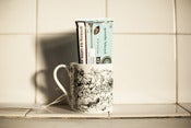 Image of Mug with a pouch of Tea