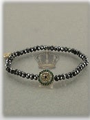 Image of GUNMETAL GREEN EVIL EYE