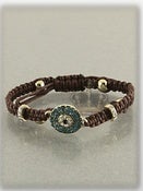 Image of DARK BROWN EVIL EYE