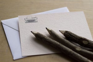 Image of typewriter notecard
