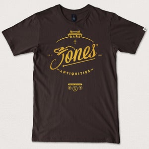 Image of “Jones' Rare Antiquities” - Dark Chocolate tee gold print
