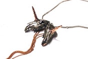Image of Double Unicorn Skull Necklace