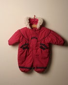 Image of c. 1980s bright pink snowsuit with booties