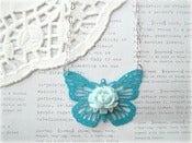 Image of Blue Butterfly with Light Blue Flower Necklace 