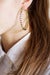 Image of studded hoop earrings