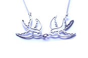 Image of Swooping Swallows