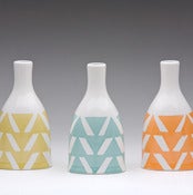 Image of triangle bottle vase