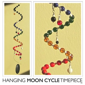 Image of Hanging Moon Cycle Timepiece | Glass | White Vertebrae
