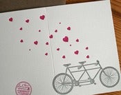 Image of heart with tandem bike
