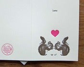Image of squirrely love