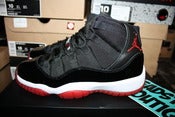Image of Air Jordan XI (11) Retro GS "Breds"