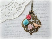 Image of Long Antique Brass Pendant with Resin Bird and Colourful Flowers Necklace