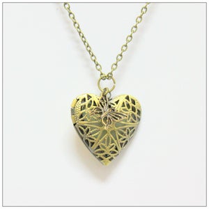 Image of Antique Filigree Perfumed Locket by Kelsey Hill
